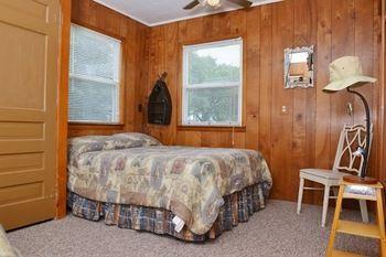 Lucky Horseshoe Cabins Hotel Au Sable Exterior photo